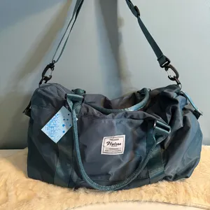 Floless Workshop Sky Blue Duffle Bag by Camill Emma thumbnail 1
