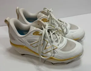 New Balance VELOv4 Women's White and Gold Athletic Sneakers Softball thumbnail 1