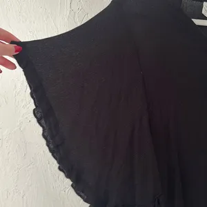 Black gauze lettuce trim button down flowy butterfly sleeve blouse thumbnail 3