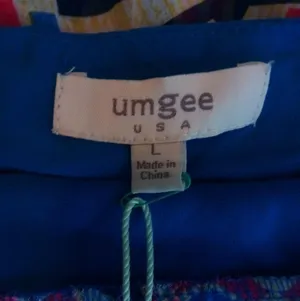 Umgee L Geo Patterned Peasant Top in Bright Blue Orange Yellow thumbnail 4