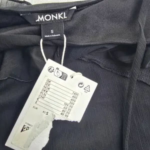 Monki NWT 46P Black Asymmetric Ruffle Midi Dress with 3D Flower Rosette Size S‎ thumbnail 4