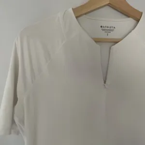 Athleta white short sleeved‎ top women's size small casual athleisure pockets thumbnail 3