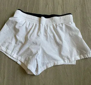 Fabletics White Athletic Shorts with Black Waist Trim thumbnail 1
