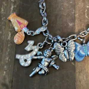 Silver tone loaded charm bracelet thumbnail 4