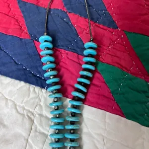 Beautiful necklace. Looks like turquoise and silver. I believe it is howlite. thumbnail 5