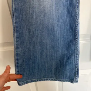 Levi's light wash low flare denim. thumbnail 8