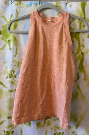 Athleta women’s orange high neck tank top. Size small. thumbnail 1