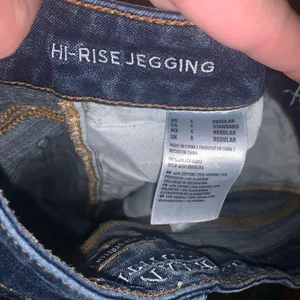 American Eagle dark wash destroyed normcore 4 hi-rise jeggings thumbnail 3