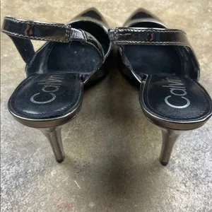 Calvin Klein Metallic Slingback Heels
Size: 9 thumbnail 6