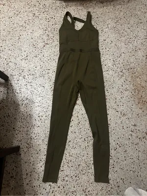 Fabletics Motion 365 onesie in olive green features a racerback design thumbnail 4