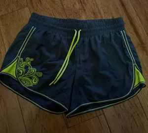 Athleta Navy Athletic Shorts with Neon Yellow Trim thumbnail 1