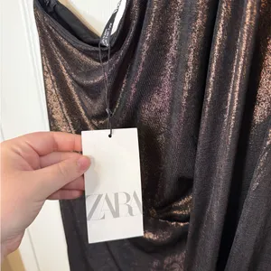 Zara One-Shoulder Shimmer Dress in Black thumbnail 12