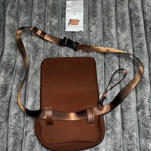 Serra Neoprene Convertible Bag in brown.‎ thumbnail 2
