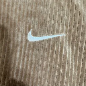 Nike Woman’s Rib Velour Quarter Zip Crop Pullover thumbnail 6