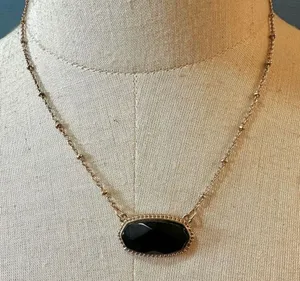 Black and gold tone pendant necklace thumbnail 1