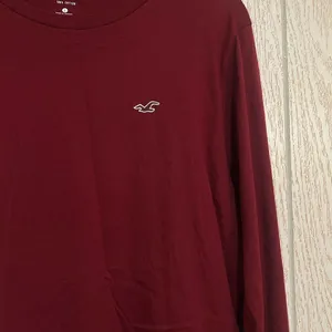 Hollister women’s large Maroon Long Sleeve Tee thumbnail 2