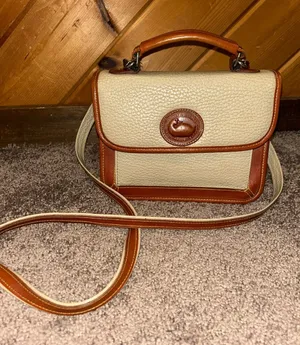 Vintage Dooney & Bourke cream and tan pebbled leather crossbody handbag thumbnail 1