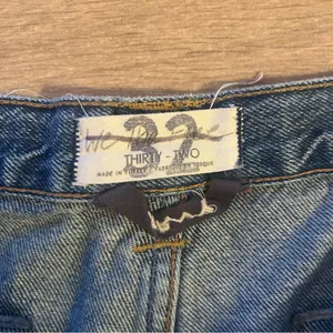 Free People We the Free CRVY Low Rise Siren Button Fly Straight in Blue Denim thumbnail 4