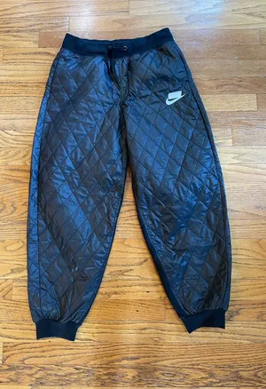Nike Black Quilted Jogger Pants with White Swoosh thumbnail 1
