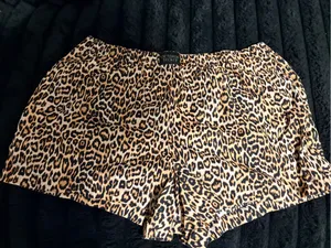 PINK Victoria's Secret Leopard Print Athletic Shorts in Tan and Black thumbnail 1