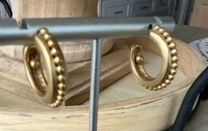 Oscar de la Renta gold tone hoop earrings thumbnail 1