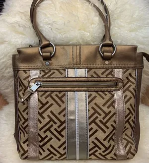 Tignanello logo handbag bronze leather accents thumbnail 1