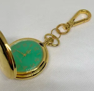 Women’s gold tone pocket watch joy & iman green dial Quartz analog 46mm running thumbnail 1