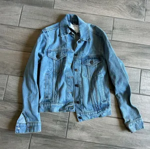 Understated Leather Light Blue Women's Denim Jacket - Classic Trucker Style thumbnail 1