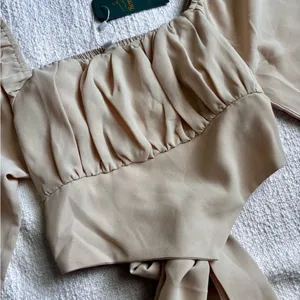 Remidoo Tan Crop Top With A Tie In The Back. Long Sleeves.‎ NWT Size Small thumbnail 2