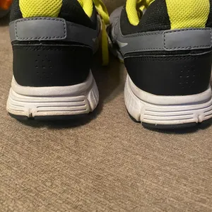 Nike women's Revolution Grey/Yellow Running Shoes. 9 thumbnail 10
