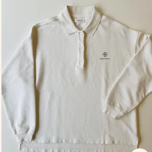 ANINE BING TATUM POLO SWEATSHIRT IN IVORY REVOLVE $200 casual logo winter thumbnail 6