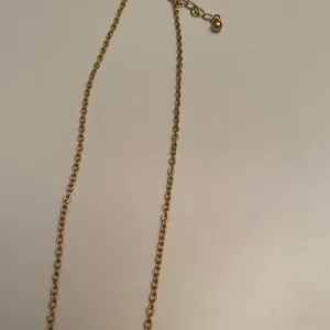 Gold and rhinestone bar necklace thumbnail 4