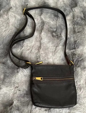 Fossil cow hide leather Black Leather Crossbody Bag with Gold Accents thumbnail 1