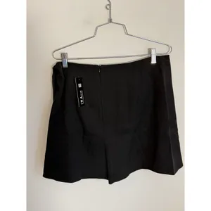 INA Black Big Bow Mini Skirt NWT size large thumbnail 4