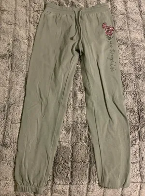Awake sage green joggers that read “grow through life” thumbnail 1