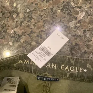 American Eagle mini skirts. Size: XXS / 00. Lot of 2. The green one is NWT. thumbnail 5
