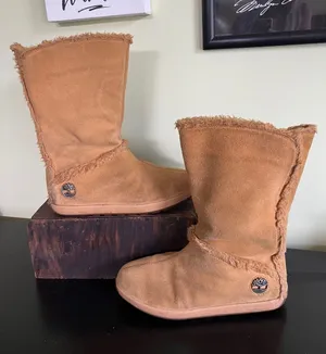Timberland women's tan suede mukluk-style winter boots thumbnail 1