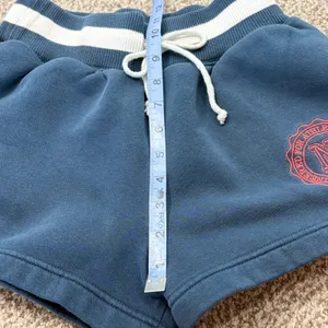 Nike Fleece Varsity Shorts Women XS‎ Navy Embroidered Crest Sweatshorts Pockets thumbnail 10