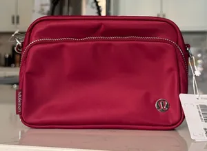lululemon athletica Everywhere Crossbody Bag 2L Raspberry Rave NWT thumbnail 1