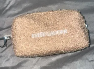 Estée Lauder Fuzzy teddy sherpa makeup pouch thumbnail 1