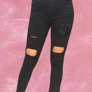 American Eagle Distressed high-waisted skinny jeans thumbnail 4