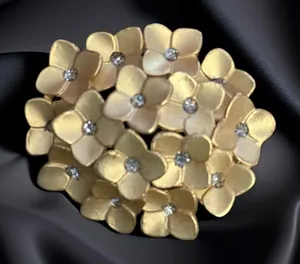 Vintage brushed gold tone floral brooch thumbnail 1