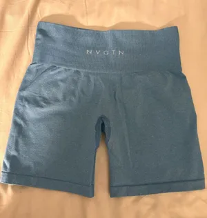 NVGTN Seamless Light Blue High-Waisted Bike Shorts thumbnail 1