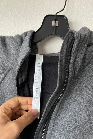 Lululemon scuba oversized half zipper hood sweater NWT. Color in heathered speckled black in original package. Size M/L item coming with one free shopping bag thumbnail 8