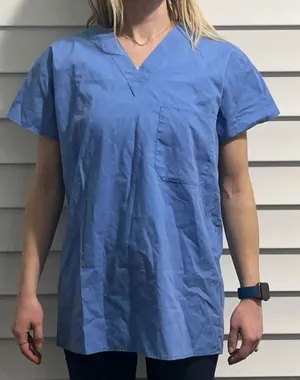 Light blue scrub top. Size XS thumbnail 1