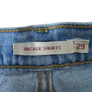 Levi's Ribcage Shorts Distressed Denim Cutoff Light Wash High Rise Size 29 thumbnail 5