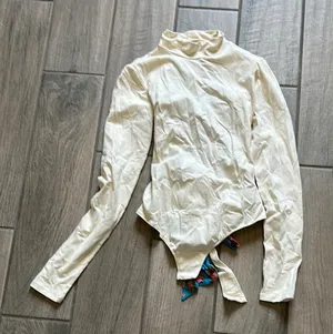 Free People Cream Bodysuit with Floral Accent thumbnail 1