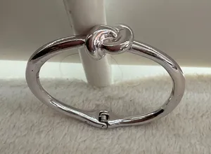 Silver plated knotted bangle thumbnail 1