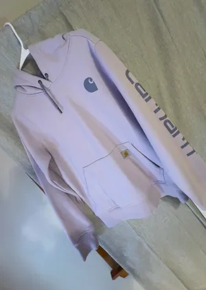 Thick, comfy Carhartt hoodie in a soft lavender/pastel purple color. Super warm heavyweight material with a relaxed, slightly oversized fit. Has a front kangaroo pocket. thumbnail 1