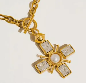 Chunky gold cross necklace with pearl and toggle clasp thumbnail 2